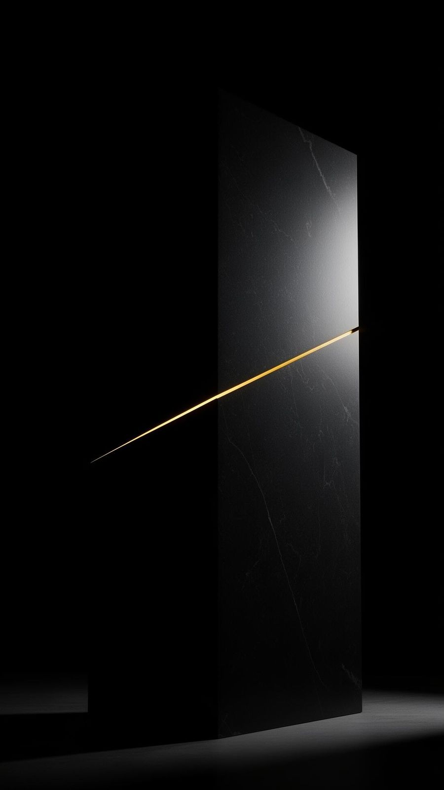 Obsidian monolith with gold accent — GRVTi Solutions